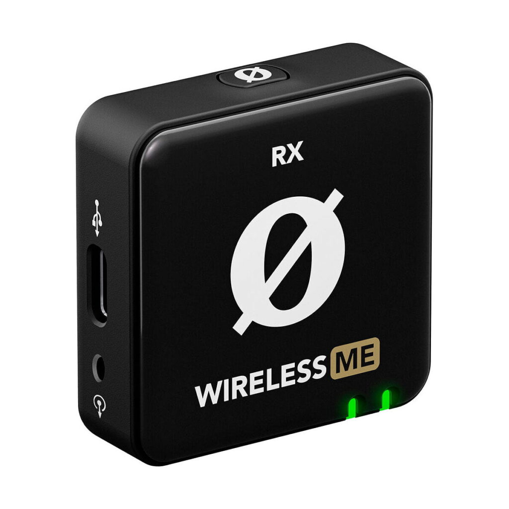 Rode Wireless ME -langaton mikrofonijärjestelmä on musta langaton vastaanotin, jossa on merkinnät RX ja WIRELESS ME Ø-logolla, kaksi vihreää LEDiä, USB-C-portti ja 3,5 mm:n ääniliitäntä sivulla.