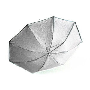 Viewed from below, the open Elinchrom D-Lite 2 it umbrella shows its metallic silver interior and support wheels against a white background.