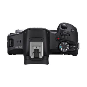 canon_r50_runko_02 Canon EOS R50 system camera - 100€ discount - top view, highlighting the selection dial, shutter button, power switch, ISO button, hot shoe mount and various controls and ports on the camera.