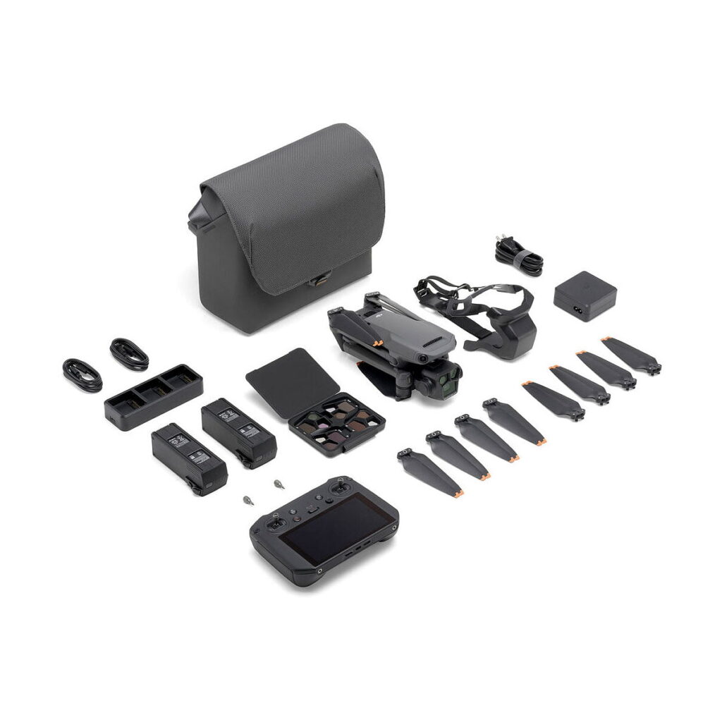 DJI_Mavic_3_Pro_Fly_More_Combo_001_Pro DJI Mavic 3 Pro + DJI RC Pro Controller + Fly More Combo includes a black drone, remote control, two batteries, propellers, carrying case, charger, cables and accessories neatly arranged on a white background.