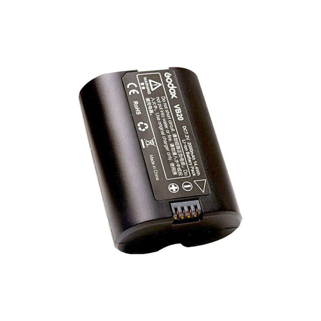 vb20 Musta Godox VB-20 akku (V350) -litiumioniakku, jossa on valkoinen merkintä ja turvasymbolit, näkyy valkoisella pohjalla, ja sen toisessa päässä on sähkökontaktit.