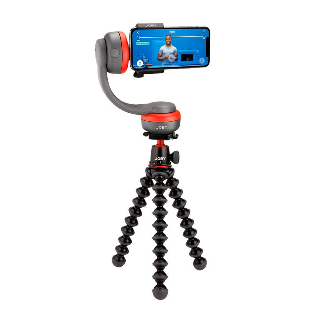 Joby-Pan-Tilt-Bracket-for-Spin-3 Joby Pan Tilt Bracket for Spin pitää älypuhelimen turvallisesti vaakasuorassa videon tai livestreamin aikana, ja laitteen joustavat punaiset ja mustat jalat ja säädettävät nivelet tarjoavat monipuolisen asemoinnin.