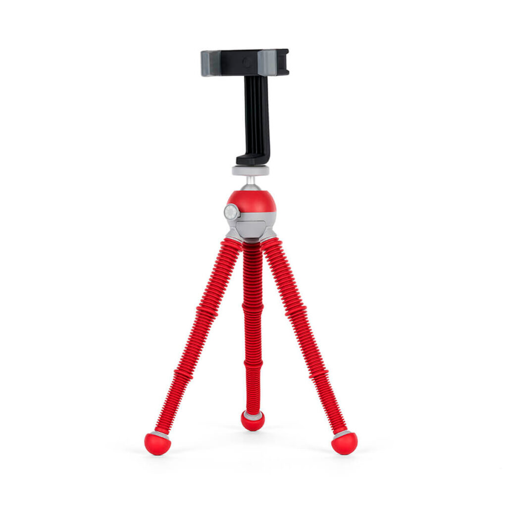 Joby-PodZilla-Flexible-Tripod-Kit-M-Punainen Joby PodZilla Flexible Tripod Kit M Punainen on kompakti punainen ja harmaa kolmella taivutettavalla jalalla ja mustalla älypuhelimen pidikkeellä varustettu kolmijalkainen jalusta, joka on suunniteltu siirrettäväksi ja säädettäväksi.