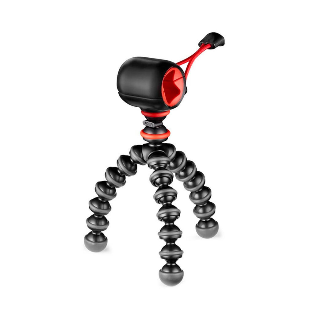 Joby Starter Kit GorillaPod10 JOBY GorillaPod Starter Kit on musta ja punainen taipuisa kolmijalka, jossa on taivutettavat jalat ja kompakti sylinterinmuotoinen kiinnike, joka on suunniteltu kameroiden tai älypuhelinten pitämiseen.