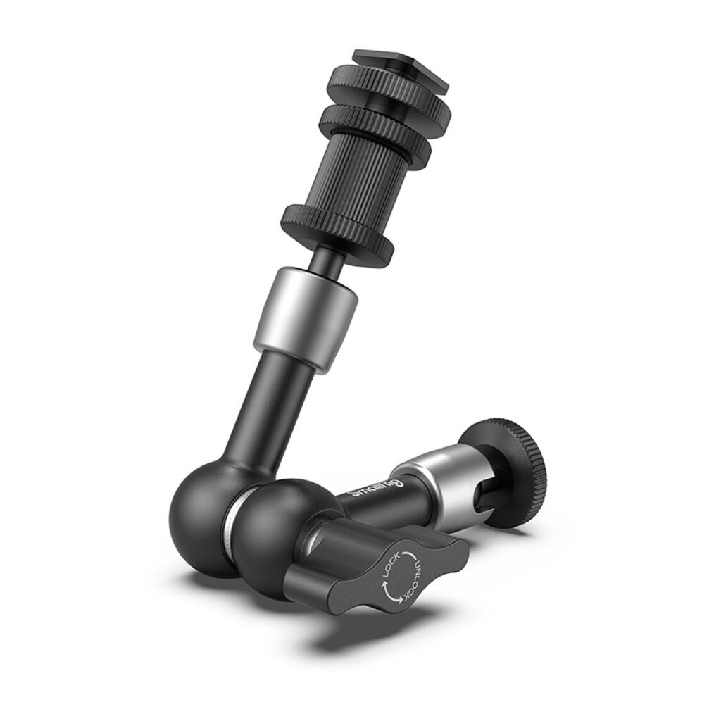 SmallRig-1497 SmallRig 1497 Articulating Rosette Arm 7" on musta säädettävä metallivarsi, jossa on useita niveliä ja nuppineuloja valokuva- tai videolaitteiden kiinnittämiseen tai sijoittamiseen, kuvassa eristettynä valkoisella pohjalla.