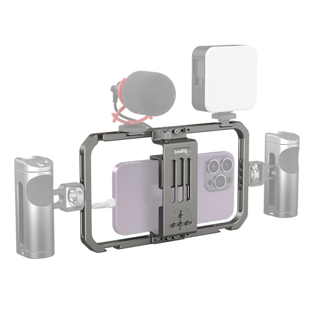 SmallRig-2791-2 SmallRig 2791 Universal Mobile Phone Cage on metallinen videoteline, jossa on kaksi sivukahvaa ja jossa on kiinnikkeet ulkoiselle mikrofonille vasemmalla ylhäällä ja LED-valolle oikealla ylhäällä, ihanteellinen mobiilivideotuotantoon.