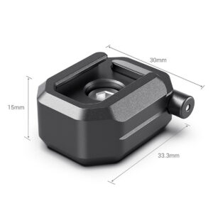 SmallRig-2797-3 SmallRig 2797 Multifunction Cold Shoe Mount w/ Safety Release on musta, suorakulmainen kameran lisävaruste (30mm x 15mm x 33,3mm), jossa on pyöristetyt reunat, keskellä oleva aukko ja sylinterinmuotoinen sivukiinnike.