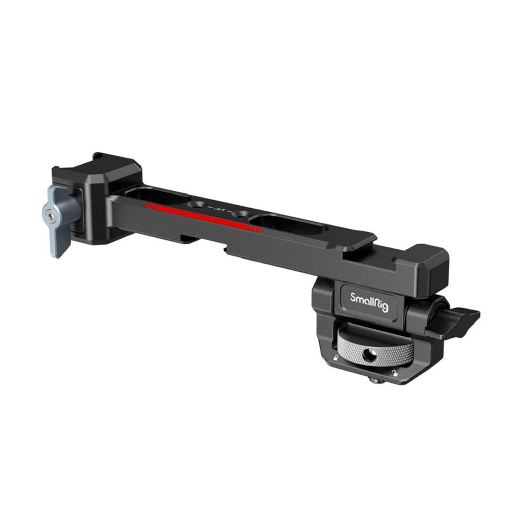 SmallRig-3026B The SmallRig 3026B Monitor Mount for DJI Ronin is a black metal mount with adjustment knobs on both ends, a red scale line in the middle and mounting hardware on the bottom left.