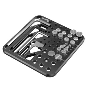SmallRig-3184 The SmallRig 3184 Screw & Hex Key Storage Plate is a black metal storage plate with marked slots for hex keys and silver screwdrivers, and a variety of holes to organize other items in the square base.