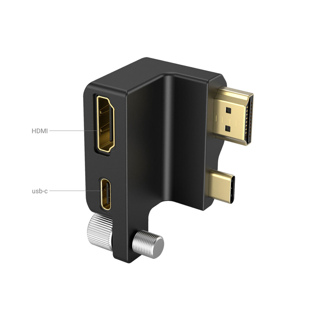 SmallRig-3289-3 SmallRig 3289 HDMI/USB-C Right Angle Adapter for BMPCC 6K Pro on musta sovitin, jossa on merkitty HDMI-, USB-C- ja koaksiaaliportit; siinä on kullanväriset HDMI- ja USB-C-liittimet ja hopeinen koaksiaaliliitin.