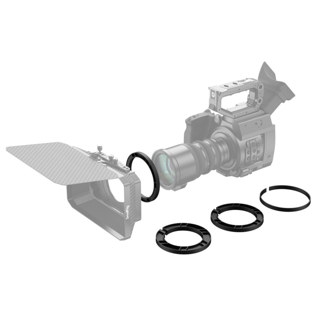 SmallRig-3408-2 SmallRig 3408 Clamp-On Ring Kit for Matte Box 2660 (80/85/95/110 mm - 114 mm) on esitetty räjähdysnäkymässä, jossa mattapakkaus, objektiivi ja pyöreät sovittimet on sijoitettu valkoiselle taustalle.