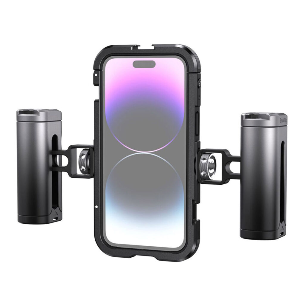 SmallRig-4078-2 SmallRig 4078 Mobile Video Cage Kit (Dual Handheld) iPhone 14 Pro Max -puhelimelle kiinnittää puhelimen vaakasuoraan kahdella sylinterimäisellä sivukahvalla, jotka takaavat turvallisen ja ergonomisen käsittelyn kuvaamista tai valokuvaamista varten.