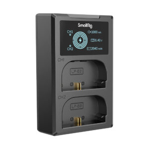 SmallRig-4084-3 The SmallRig 4084 battery charger for LP-E6 batteries is black and features an LCD display showing the charging status, two slots marked CH1 and CH2, and metal contacts for charging.