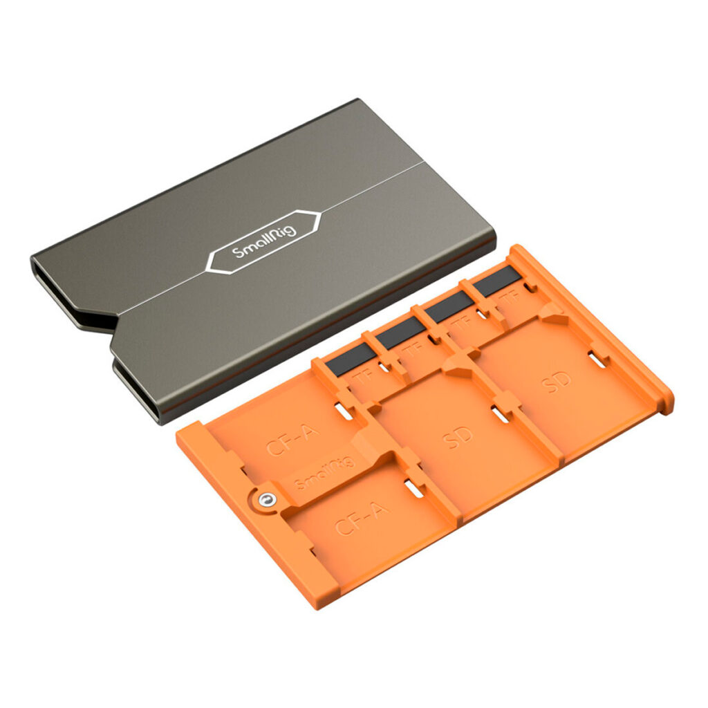 SmallRig-4107 The SmallRig 4107 memory card case for Sony CFexpress Type A has a metal outer surface and an orange inner compartment, marked slots for CFexpress and SD cards, and the compartment is partially pulled out of the case.