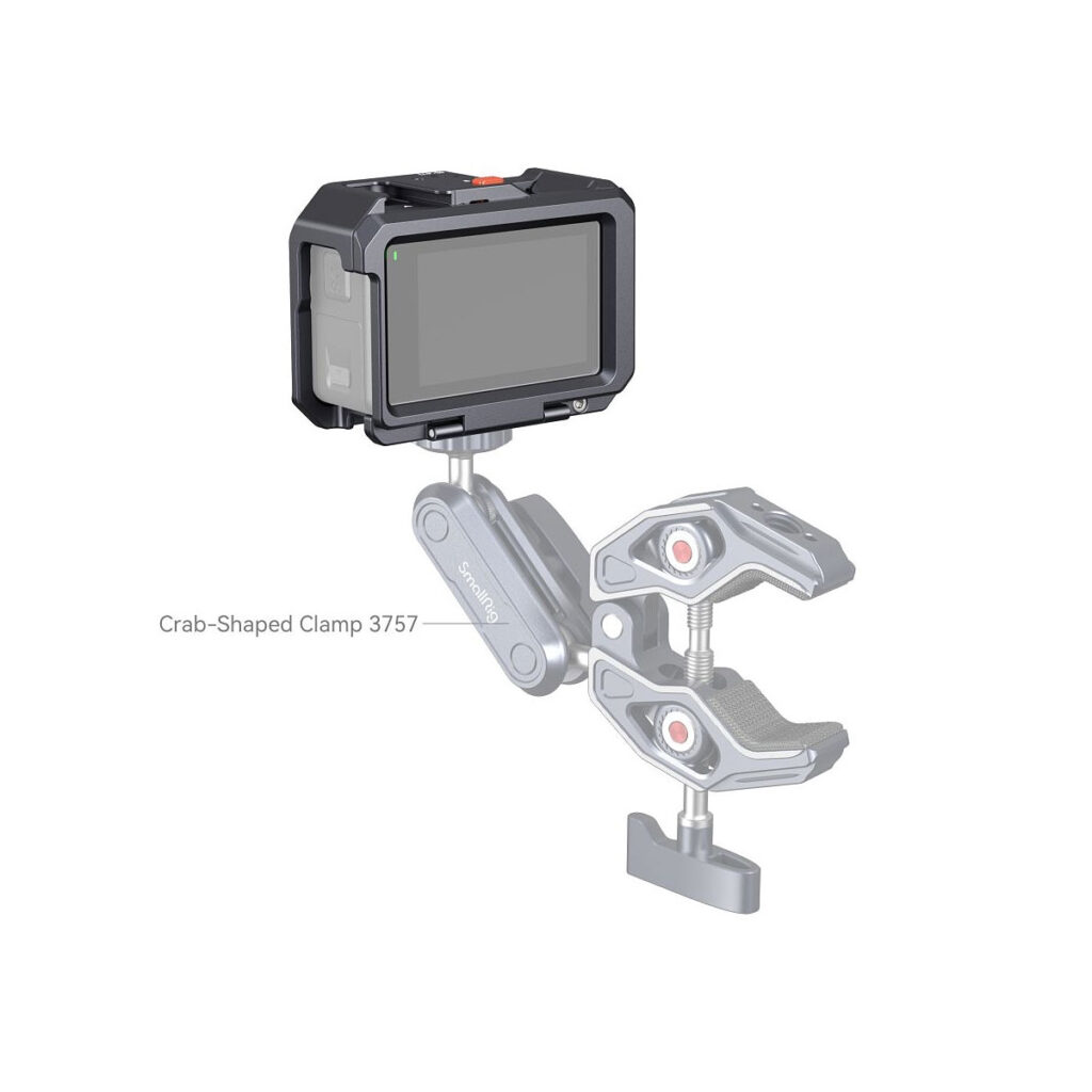 SmallRig_Cage_for_DJI_Osmo_Action_3_4119_008 The digital camera is attached to a mechanical arm, which is attached to the SmallRig 4119 Cage for DJI Osmo Action 3/4. The cage is adjustable and designed to hold the camera securely on different surfaces.