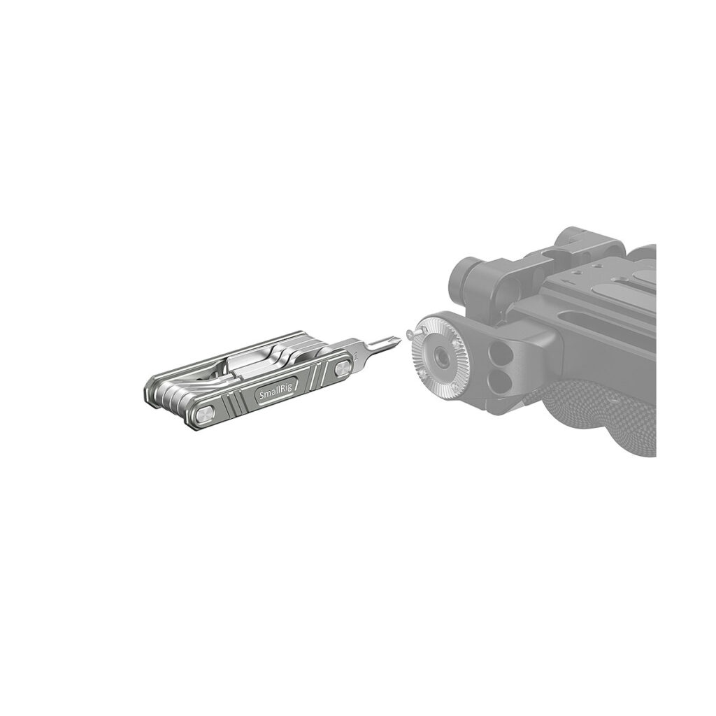 SmallRig_Universal_9-in-1_Folding_Multi-Tool_Kit_for_Videographers_TC2713_006 The SmallRig 2713 Universal 9-in-1 Folding Multi-Tool Kit for Videographers is displayed next to the firearm adjustment wheel on a white background, highlighting the multi-tool's compatibility with firearm adjustments.