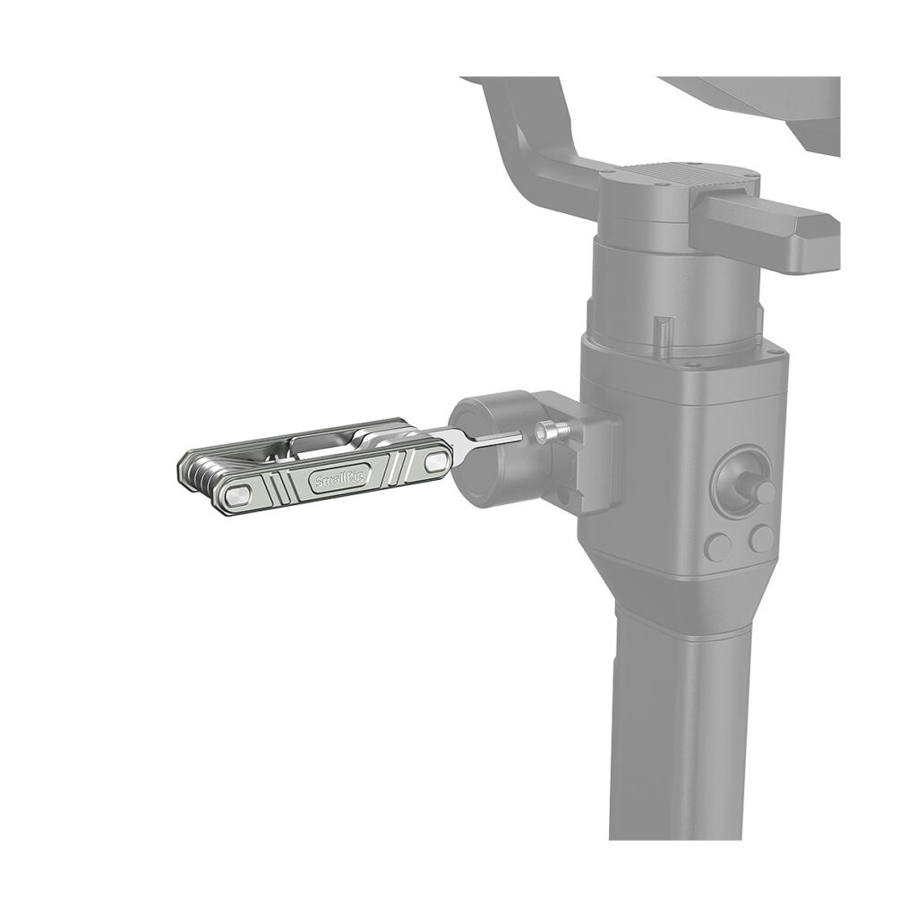 SmallRig_Universal_9-in-1_Folding_Multi-Tool_Kit_for_Videographers_TC2713_008 The SmallRig 2713 Universal 9-in-1 Folding Multi-Tool Kit for Videographers is mounted horizontally on the side of a black cylindrical stand with a small bracket. The background is plain white.