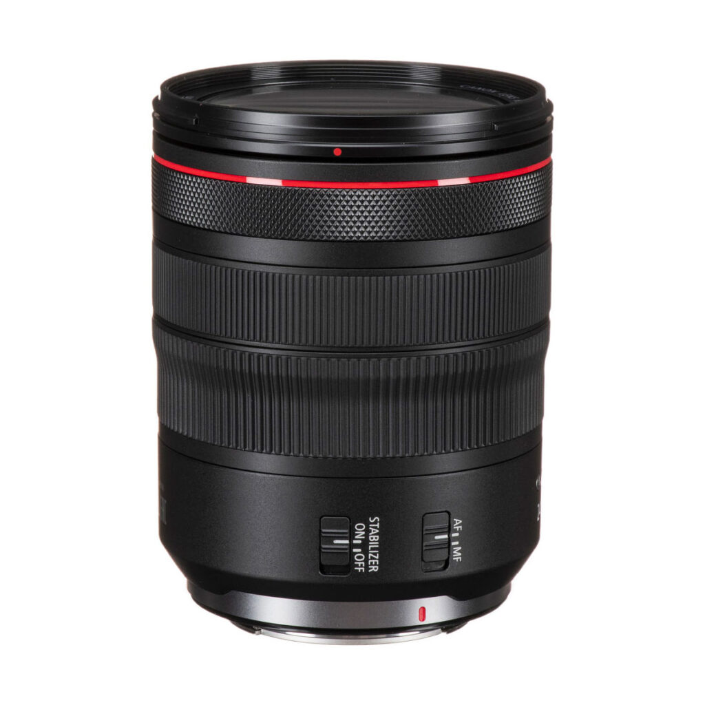 canon_rf_24-105mm_f4_01 The Canon RF 24-105mm f/4 L IS is a black lens with a red ring, textured grip and side switches for image stabilisation ON/OFF and AF/MF, shown upright on a white background.