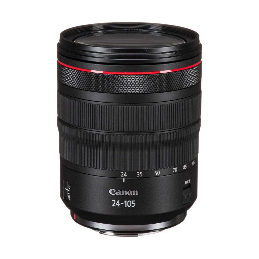 canon_rf_24-105mm_f4_03 The Canon RF 24-105mm f/4 L IS camera lens with black body, red accent ring, zoom markings and lock switch is photographed vertically against a white background.