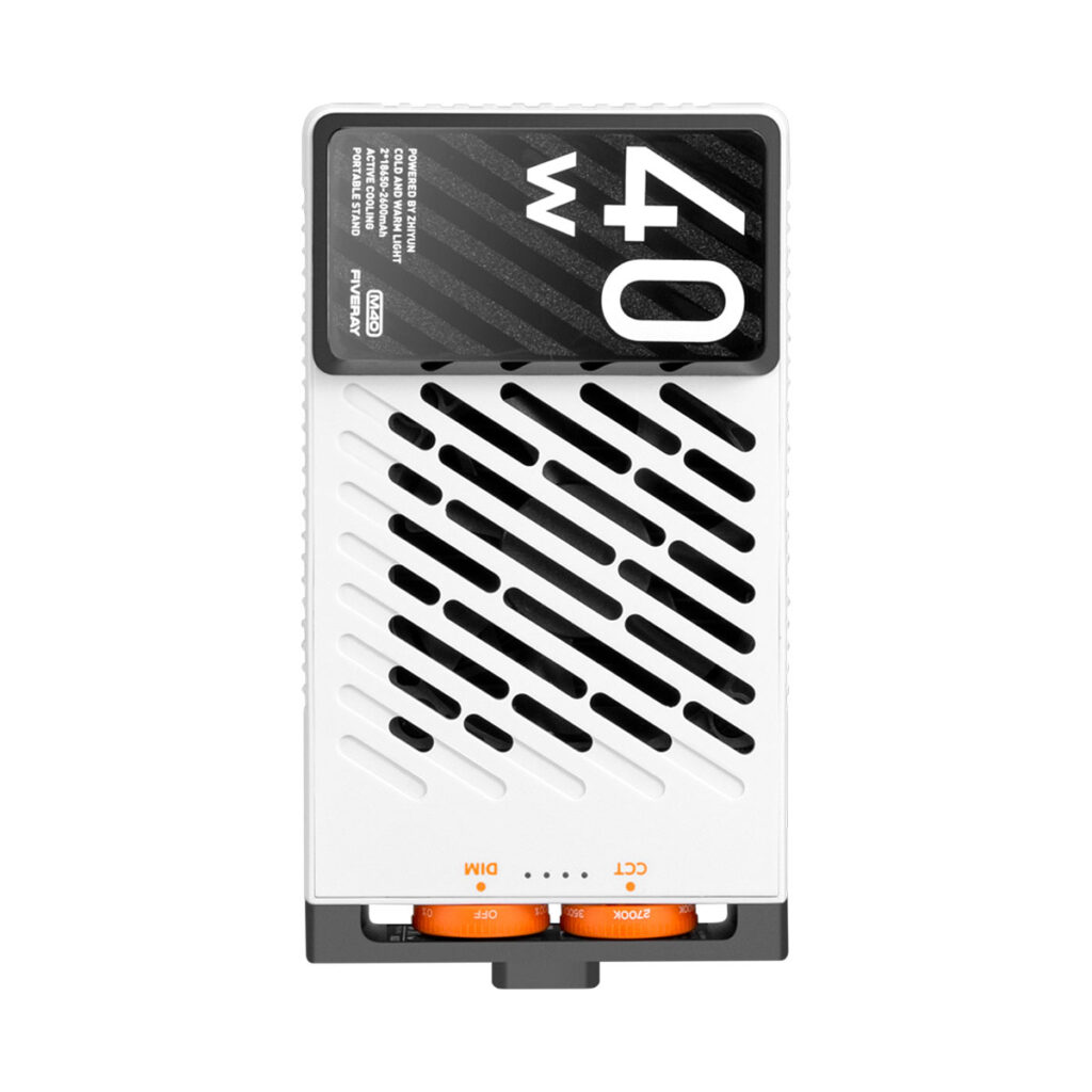 Zhiyun_Fiveray_M40_001 The Zhiyun Fiveray M40 Pocket Light is a white rectangular 40 watt device with black diagonal vents, an orange control knob at the bottom and a black display with the words "40W" at the top.