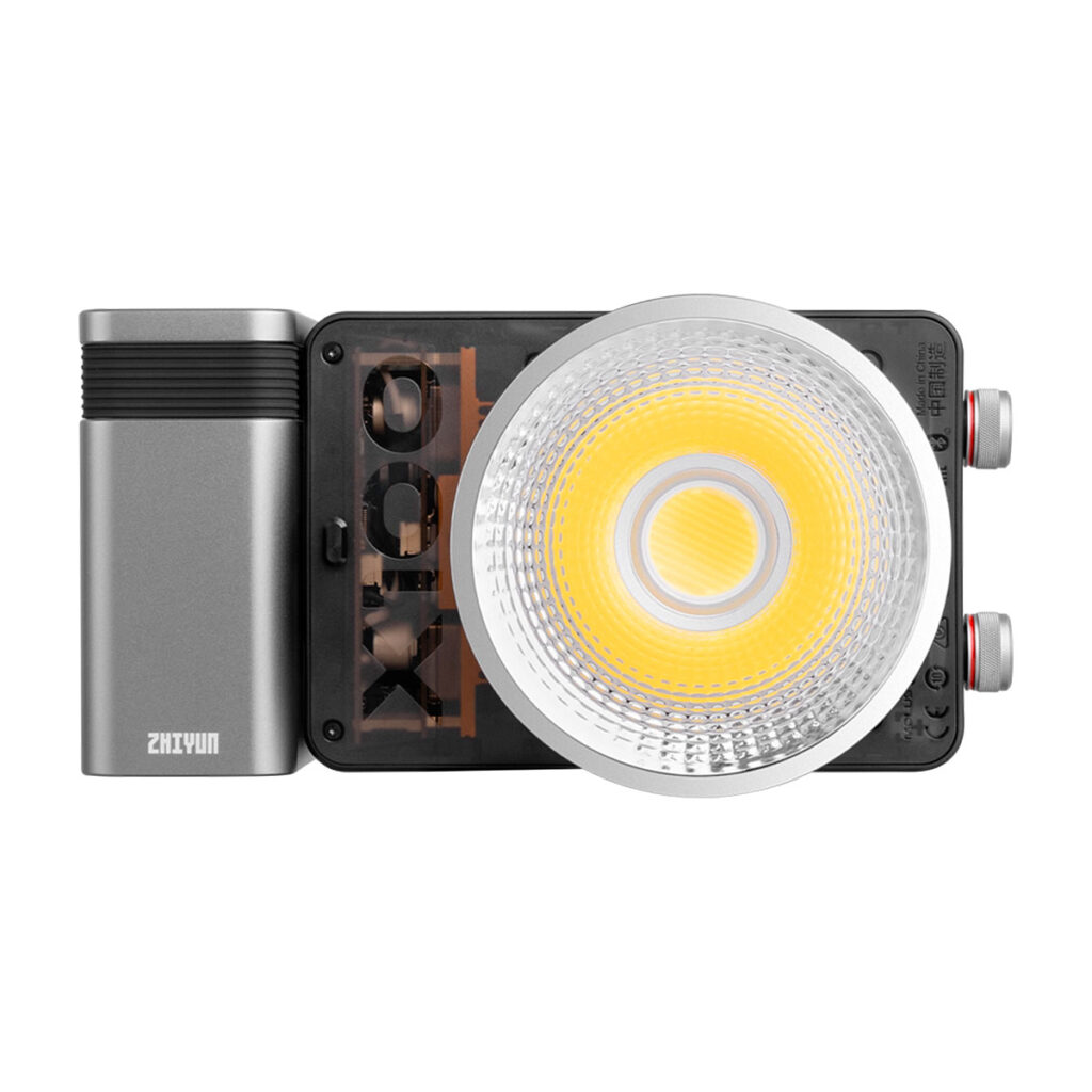 Zhiyun_Molus_X100_002 The top view of the Zhiyun LED Molus X100 COB Light Pro shows its large circular lens, metal housing on the left and adjustment wheels on the right.