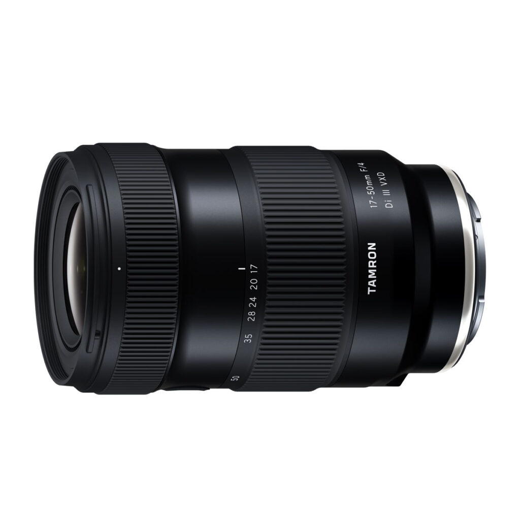Tamron_17-50_f4_002 Tamron 17-50mm F/4 Di III VXD lens (Sony E), black zoom lens with visible focal length, aperture markings and brand name, shown from the side on a white background.