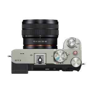 sony_a7c_ii_28-60mm_01 Top photo of the Sony A7C II + 28-60mm f/4-5.6 OSS, showing the silver camera with control dials, buttons and power switch on the right. Includes €100 Cashback offer.