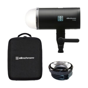 elinchrom_three_04 Elinchrom THREE -studiovalaisin mustana, kuvassa kupolidiffuusori, pyöreä hopeinen heijastin ja yhteensopiva musta kantolaukku valkoisella pohjalla.