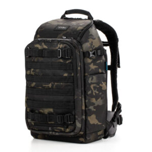 tenba_axis_20l_camo_03 The Tenba Axis v2 20L Backpack MultiCammusta features a black and dark green camouflage pattern, multiple zippered compartments, adjustable straps and a padded top handle.