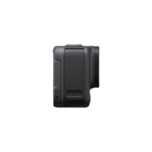 Insta360_Acepro_007 The side view of the Insta360 Ace Pro 8K Action Camera shows its textured grip, small button near the bottom and flat rectangular panel. The dark grey camera body has a slightly protruding lens on the right side.