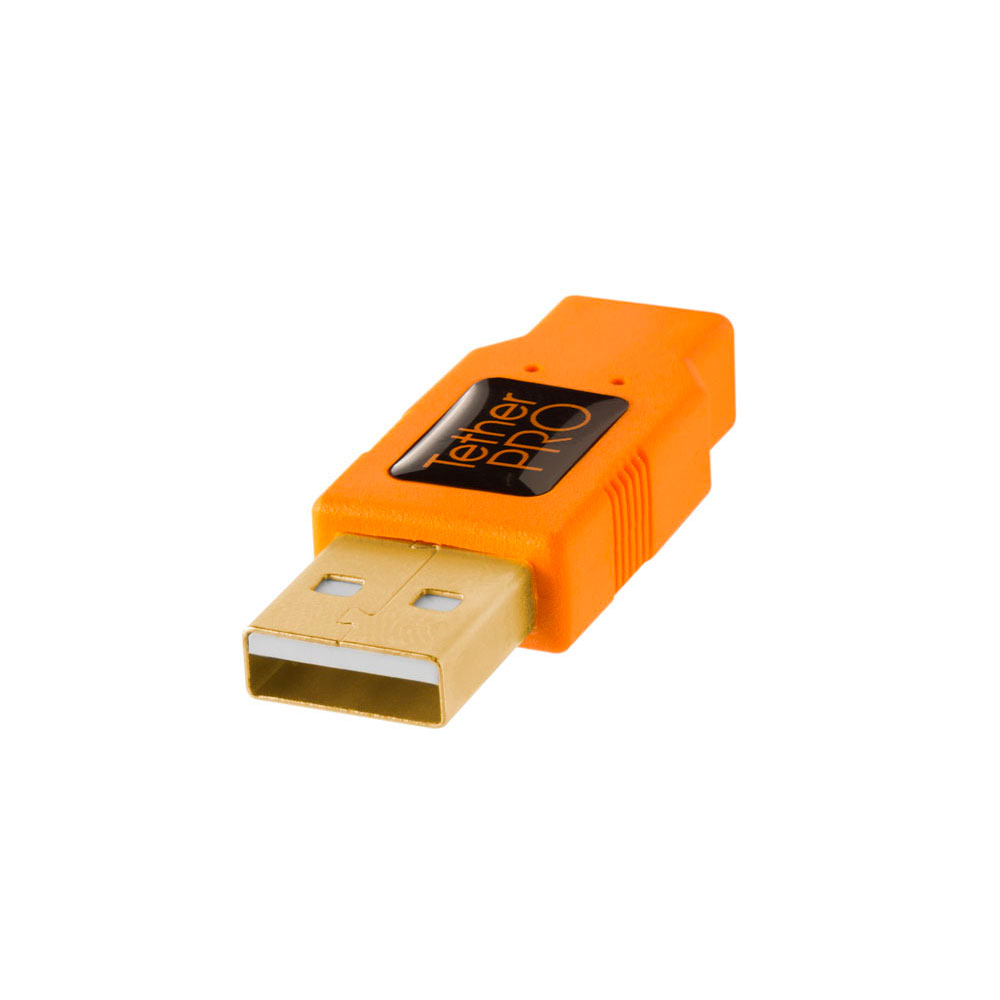 TetherPro-USB-20-to-Mini-B-8-Pin-01 Close-up of the orange Tether Tools TetherPro USB A 2.0 - Mini-B 8-pin adapter with gold connector and "Tether Pro" marking on a white background.