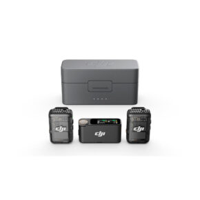 DJI_Mic2_1+2_003 The DJI Mic 2 Dual Kit wireless microphone system includes two black transmitters with digital display and a receiver, which appear in front of a grey rectangular charging case on a white background.