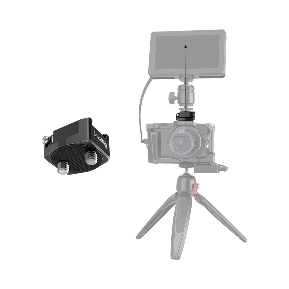 Kaavio, jossa SmallRig 2819 Rotatable Cold Shoe Mount Adapter (2x 1/4") vasemmalla ja kamera, jalusta ja ulkoinen näyttö oikealla. Nuoli osoittaa sovittimesta kameran lisälaiteporttiin.