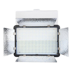 1461061466_201 The Godox LED 500LR-W Daylight is a rectangular panel luminaire with rows of small LED bulbs and four adjustable, textured silver-coloured barn doors to direct the light, shown against a white background.