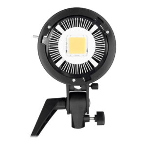 1600153121_915 Lähikuva Godox SL60Y -LED-valosta, mustasta studiovalaisimesta, jossa on pyöreä jäähdytyselementti, kiinnitetty jalka ja suuri neliönmuotoinen LED-paneeli keskellä.