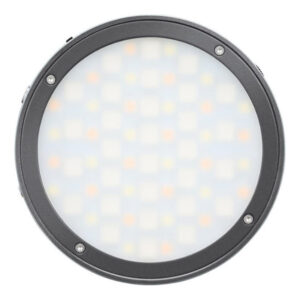 1600865319_239 Godox R1 Mobile RGB LED -valaisin - Harmaa sisältää pyöreän, himmeän paneelin mustassa kehyksessä, jossa on neljä näkyvää ruuvia, ylhäältä päin kuvattuna valkoisella pohjalla.