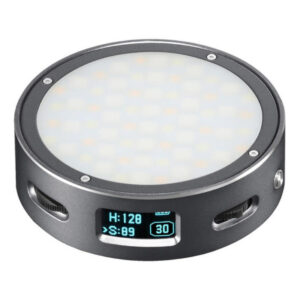 1600865320_684 Godox R1 Mobile RGB LED-valaisin - Harmaa on pyöreä, kannettava LED-valaisin, jossa on digitaalinen näyttö ja asetukset ja joka on sijoitettu metalliseen koteloon, jossa on venttiilimäiset sivuurat.