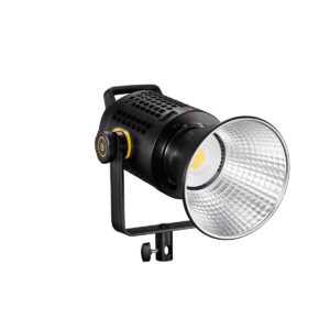 1612169486_337 Godox UL60 Silent -videovalaisin on musta studio-LED, jossa on kahva, säädettävä jalusta ja suuri heijastava hopeinen kartio, jossa on keltainen LED. Virtapainike sijaitsee laitteen sivulla.