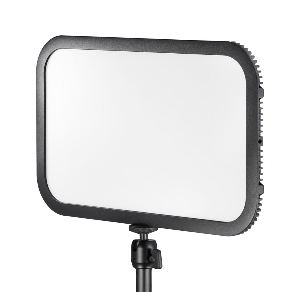 1612784139_046 The Godox E-sports LED Light ES45 Kit features a rectangular LED panel with a black bezel mounted on a black adjustable stand against a white background.
