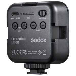 1619619734_364 Godox Litemons LED-valo (Bi Color) LED6Bi on kompakti musta valaisin, jossa on ohjauspainikkeet, kytkin, merkityt portit ja sertifiointimerkinnät takaosassa ja joka on suunniteltu kiinnitettäväksi kameraan tai jalustalle.