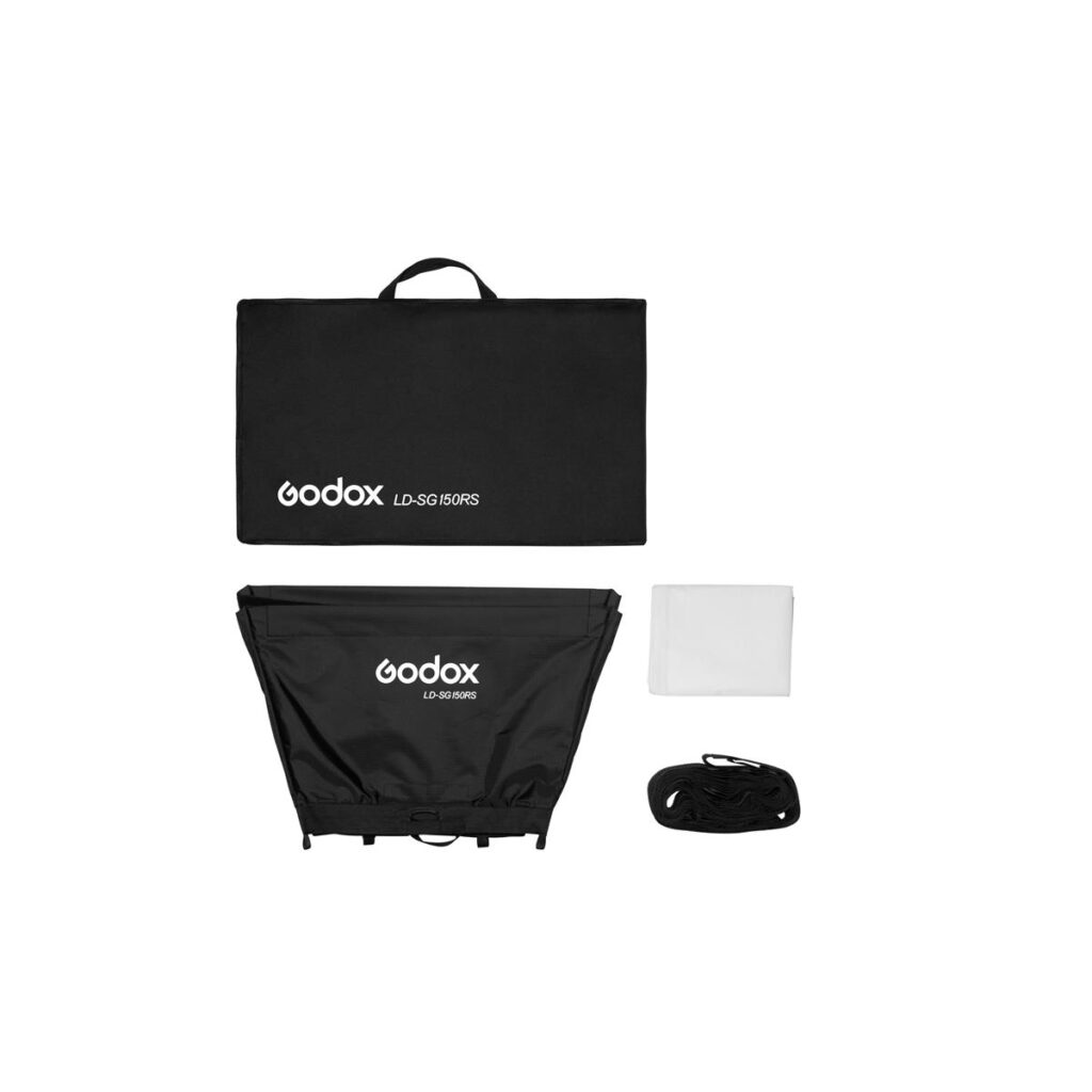 1621495835_843 Godox LD150RS Softbox-sarja, jossa on musta kantolaukku, taitettu softbox, valkoinen diffuusiokangas ja virtajohto valkoisella pohjalla.