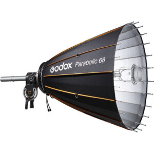 1637062296_346 Godox Parabolic Reflector Zoom Box P68Kit on musta softbox, jossa on oranssit korostukset ja hopeinen sisustus, ja siinä on metallinen kiinnike studiovalaistukseen.