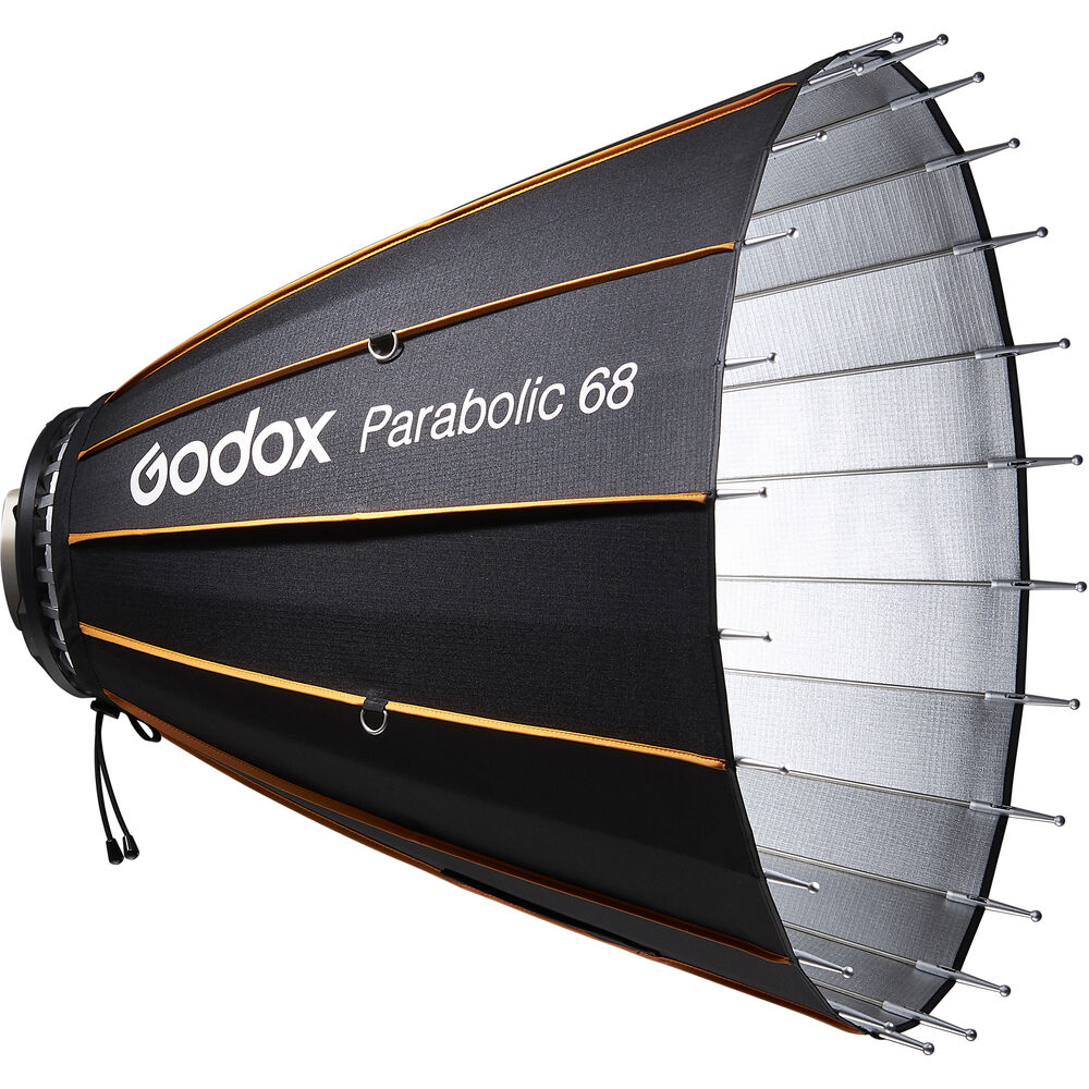 1637062296_453 Godox Parabolic Reflector Zoom Box P68Kit on suuri softbox-valonmuokkain, jossa on musta ulkokuori, oranssit korostukset ja metallitangot, ihanteellinen ammattimaiseen valokuvausvalaistukseen.