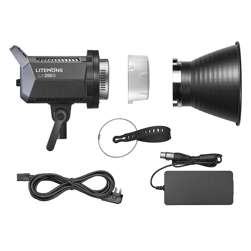 1645167292_698 Studiovalosarja, jossa on musta Godox Litemons LED-videovalaisin LA200D -LED-valo, diffuusori, heijastin, virtalähde, kaapeli, hihna ja hopeinen kiinnitysrengas, kaikki siististi järjestetty valkoiselle taustalle.