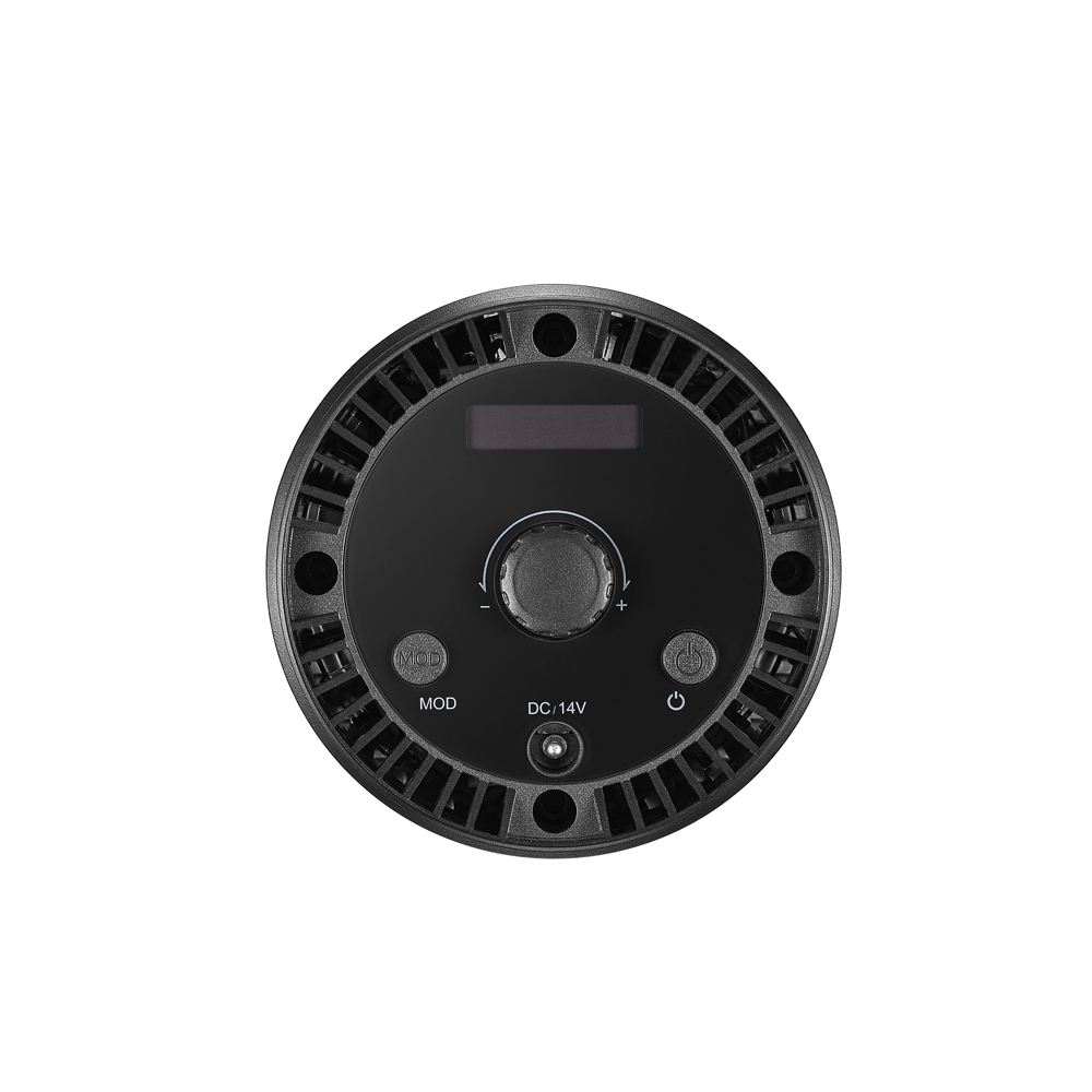 1660056754_808 Godox Litemons LED LC30D -pöytävideovalaisimessa on pyöreä musta elektroninen ohjauspaneeli, jossa on keskisäädin, yläpuolella oleva näyttö, useita painikkeita ja merkittyjä portteja, kuvattuna ylhäältä päin valkoisella pohjalla.