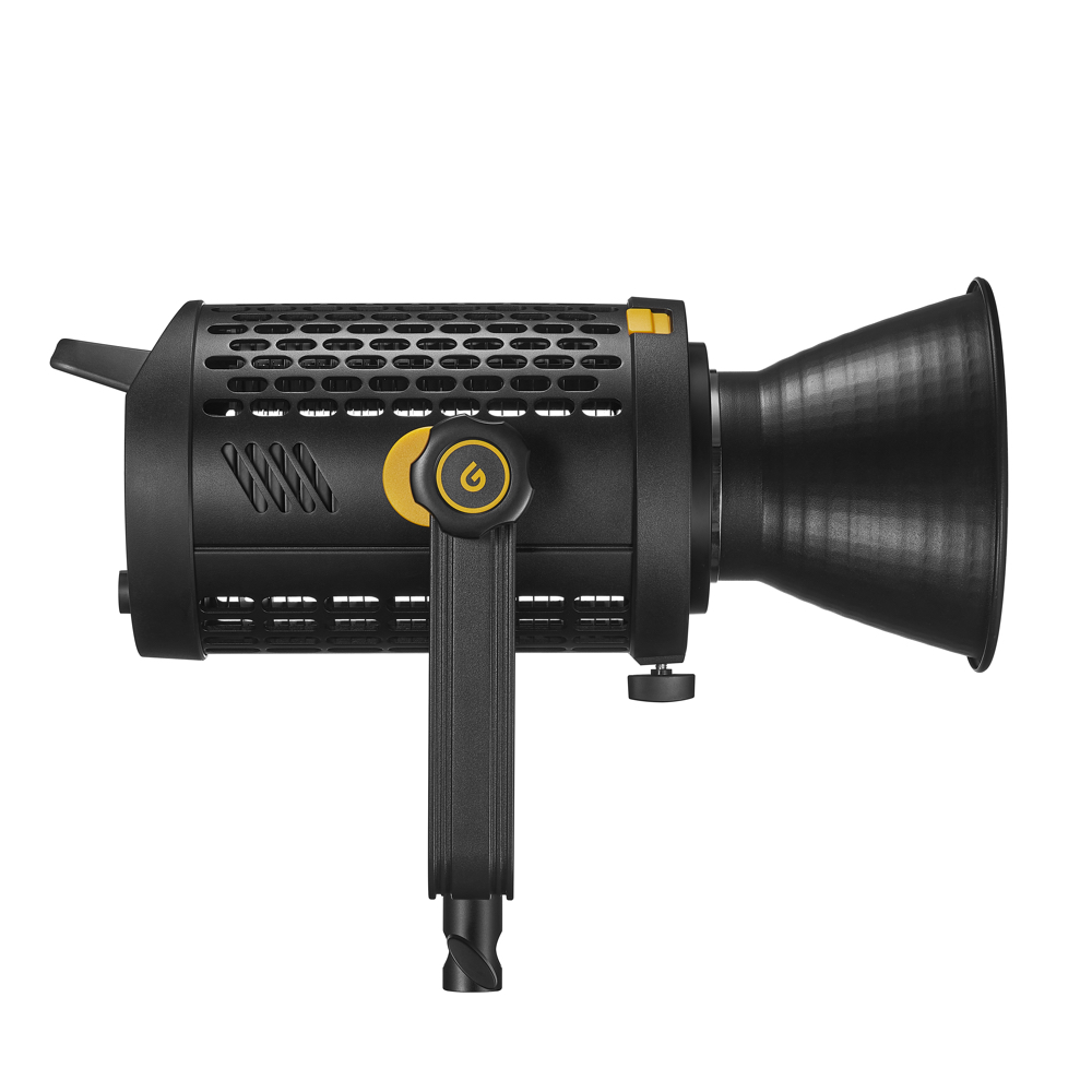 1660124410_864 Godox LED UL150 II Bi Silent Video Light - LED-valo -valaisimessa on musta lieriömäinen runko, jossa on tuuletusaukot, suuri heijastin ja ohjauspainikkeet, kuvassa sivuprofiili valkoista taustaa vasten.