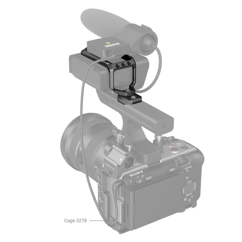 1668512793_165 SmallRig 3990 Top Plate for Sony FX3 XLR Unit tukee haulikkomikrofonia ja langatonta vastaanotinta, jotka on asennettu Sonyn kameran kahvaan häkillä 3278, joka on esitetty teknisen kuvituksen tyyliin.