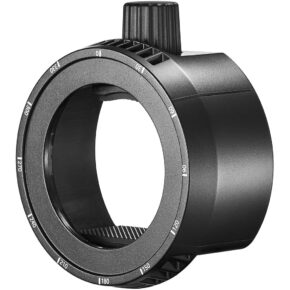 Godox-sovittimen pidike Fresnel-salamapäähän AK-R25 on musta sylinterinmuotoinen lisävaruste, jossa on suuri keskiaukko ja yläreunan nuppi, jossa on numerosäädöt sen ulkoreunan ympärillä.