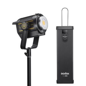 1675094453_738 Godox VL200II LED-videovalaisin -LED-valo on asennettu jalustalle, ja sen vieressä on suorakulmainen musta ulkoinen ohjausyksikkö, jossa on näyttö ja valitsin, joissa molemmissa on keltaiset korostukset.