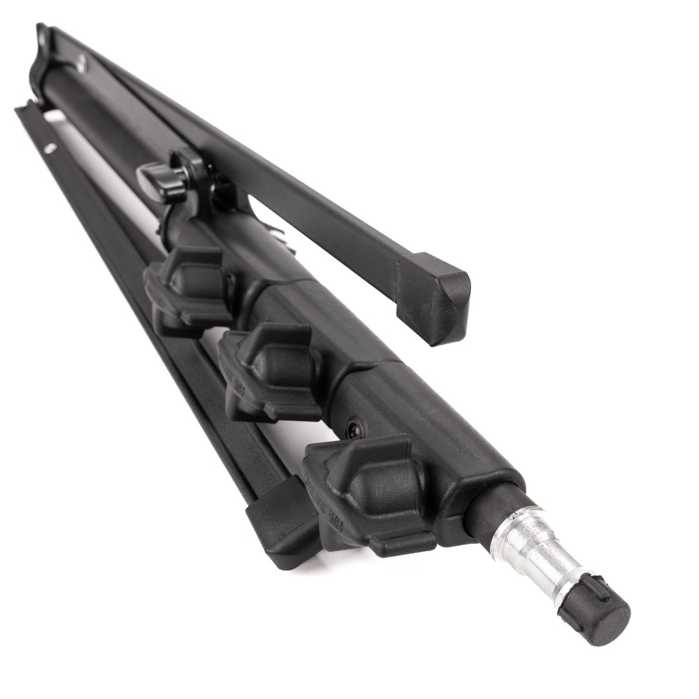 1680701227_926 The Godox 210B is shown folded and features a black metal construction with three control knobs and a silver mounting tip on the front. Its legs are compactly folded.